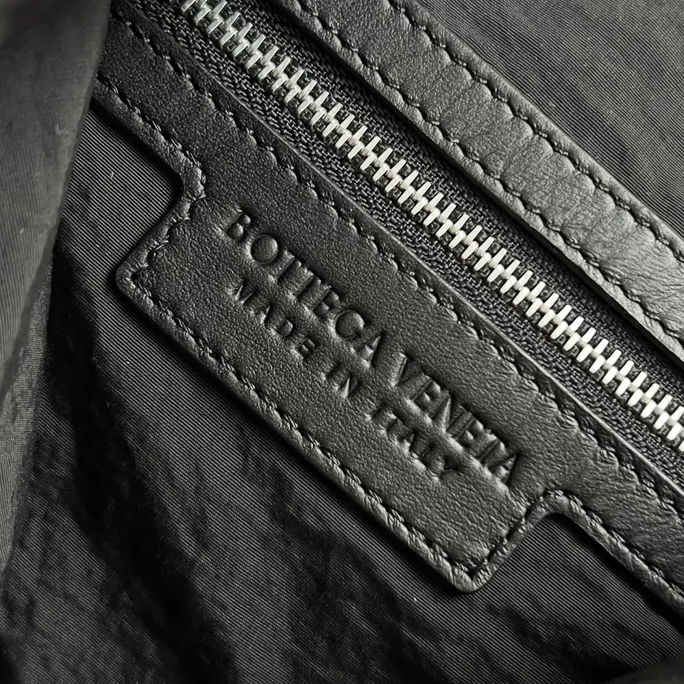 Bottega Veneta Intrecciato Flap Backpack for Unisex in Black