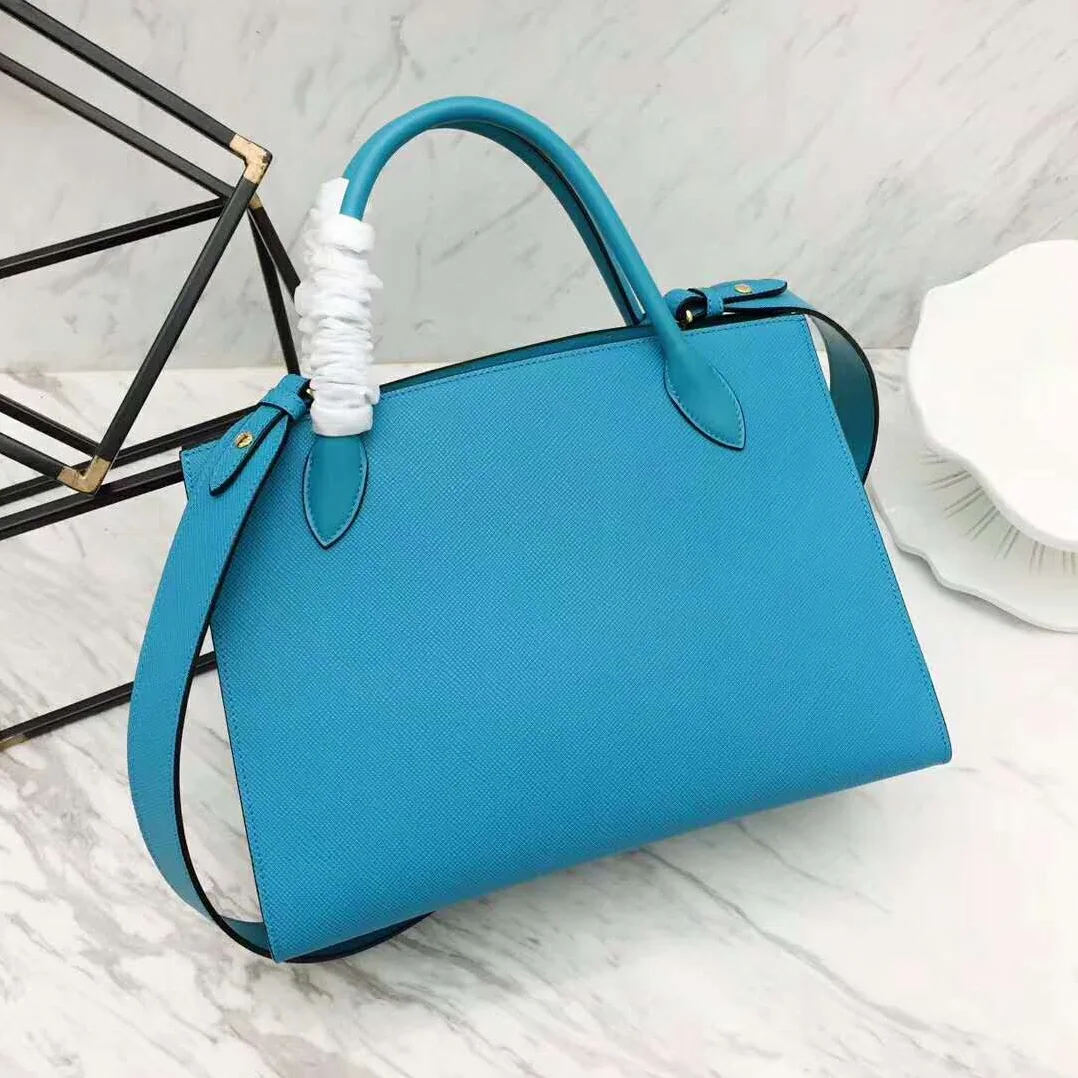 Prada Monochrome Handbag in Saffiano and Calf Leather in Aqua Prada Monochrome Handbag in Saffiano and Calf Leather in Aqua