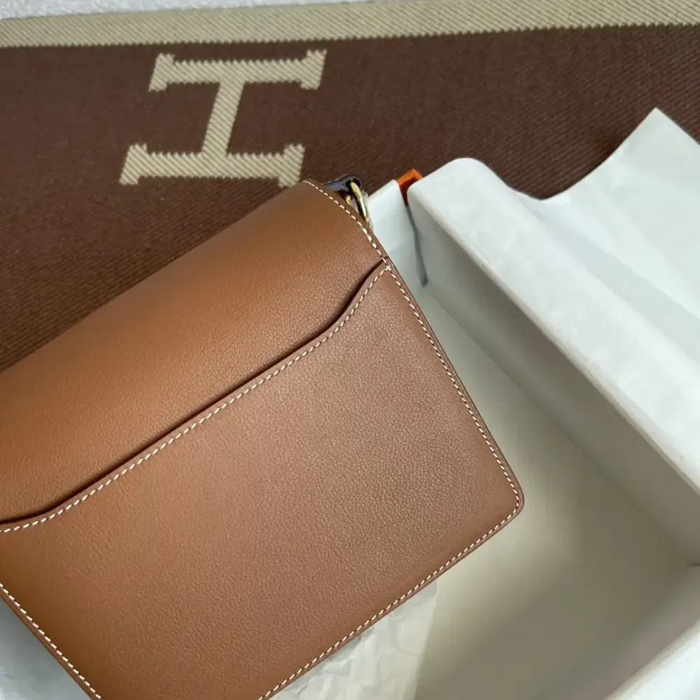 Hermes Roulis Mini Bag in Evercolor Calfskin for Women in Brown/Gold Hermes Roulis Mini Bag in Evercolor Calfskin for Women in Brown/Gold