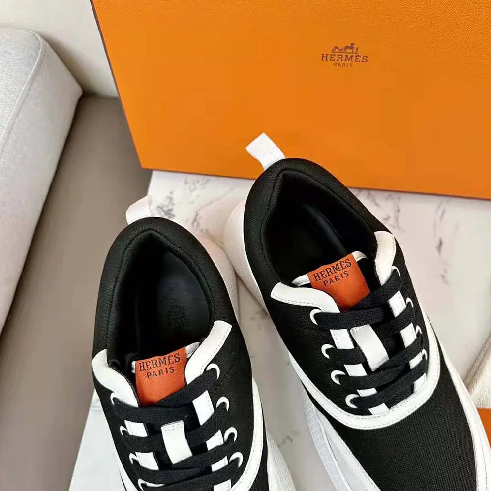 Hermes Giga Sneaker in Mesh Pique and Calfskin for Women in Black Hermes Giga Sneaker in Mesh Pique and Calfskin for Women in Black