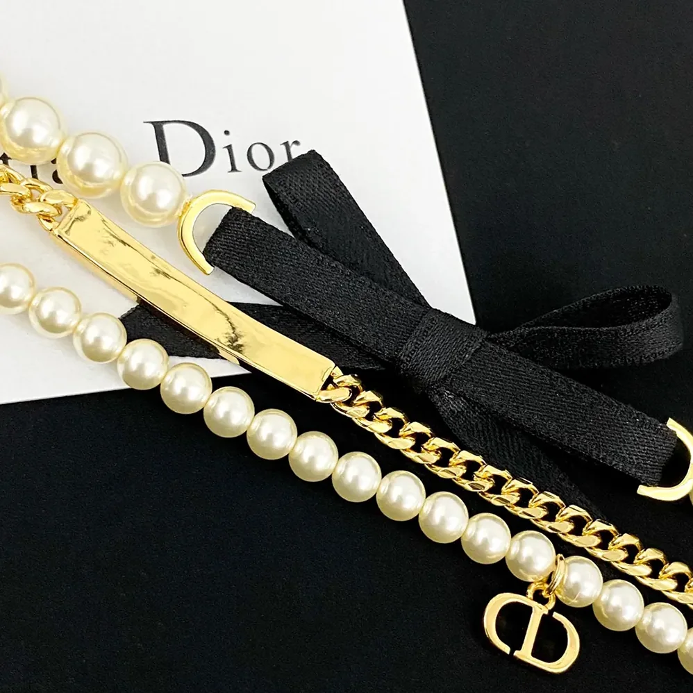 Dior Le Nœud de Dior Choker Gold-Finish Metal with White Resin Pearls and Black Satin for Women Dior Le Nœud de Dior Choker Gold-Finish Metal with White Resin Pearls and Black Satin for Women
