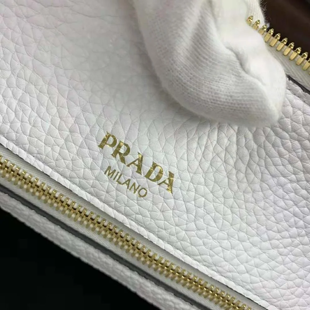 Prada Leather Handbag with Metal lettering Logo on the Front for Women in White