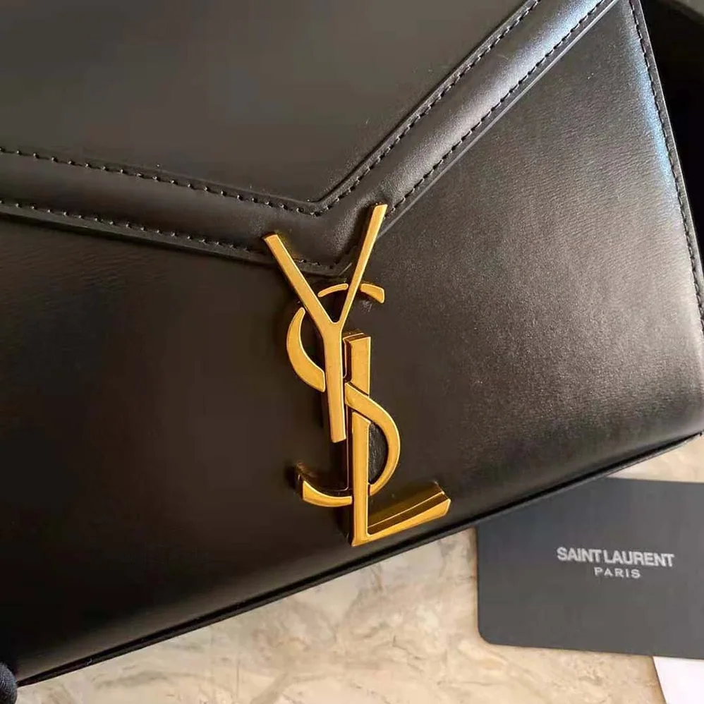 Saint Laurent YSL Cassandra Mini Top Handle Medium Bag in Grain DE Poudre Embossed Leather for Women in Black Saint Laurent YSL Cassandra Mini Top Handle Medium Bag in Grain DE Poudre Embossed Leather for Women in Black