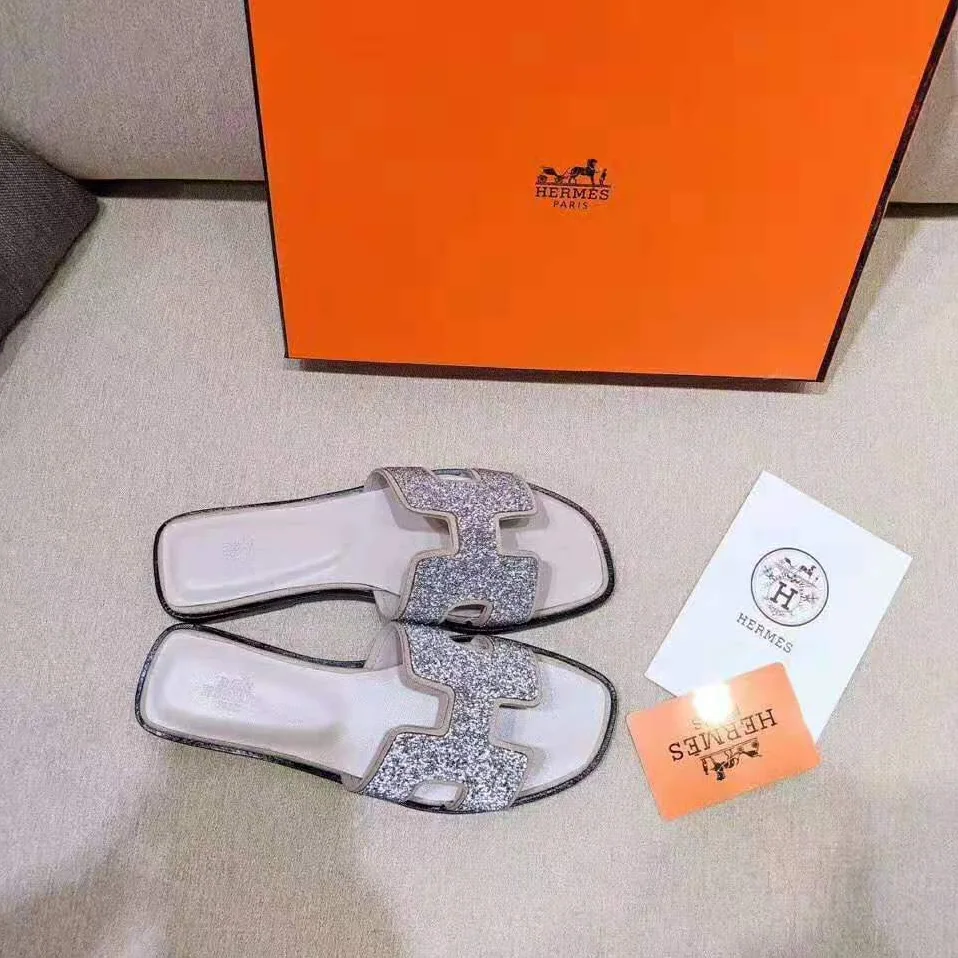 Hermes Oran Sandal Hermes Sandal in Metallic Nappa Leather and Cristal Powder for Women in Sandy