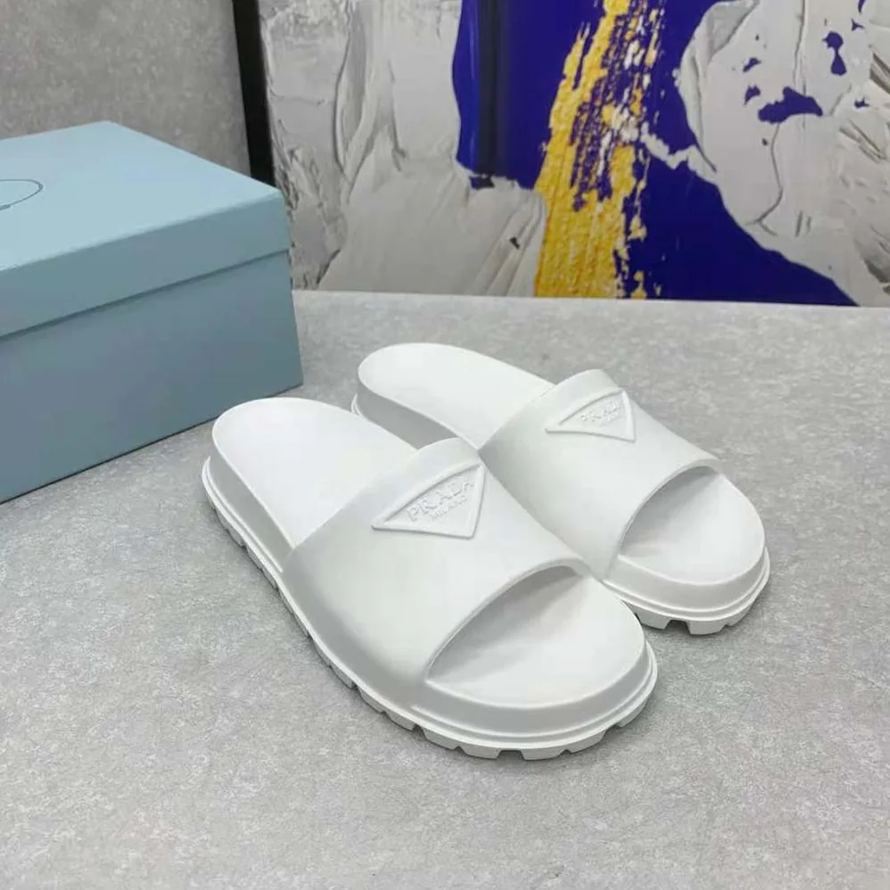 Prada Rubber Slides In 20 mm Heel Height for Women in White Prada Rubber Slides In 20 mm Heel Height for Women in White