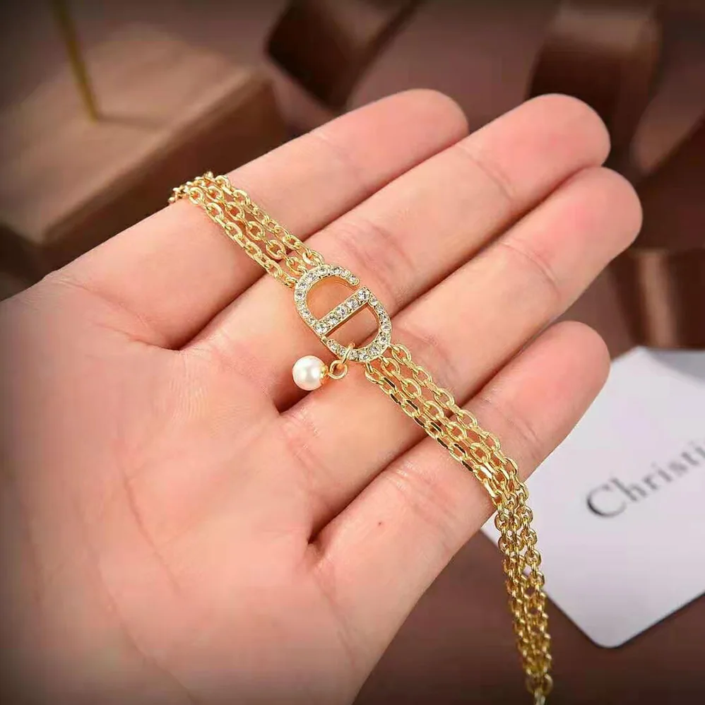 Dior Multi-chain Petit CD Bracelet Gold-Finish Metal and White Crystals for Women Dior Multi-chain Petit CD Bracelet Gold-Finish Metal and White Crystals for Women