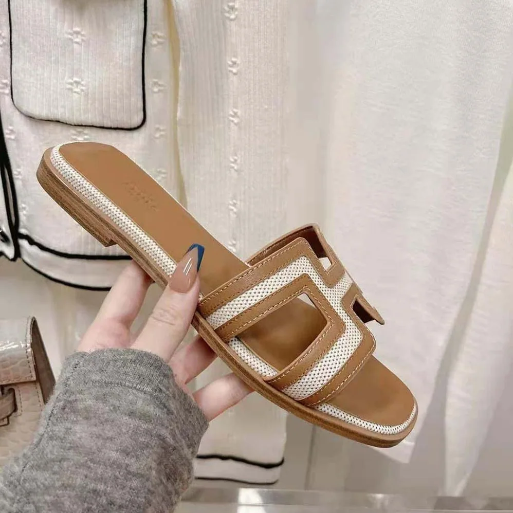 Hermes Oran Sandal in Calfskin and H Canvas with Iconic H Cut for Women in Out Hermes Oran Sandal in Calfskin and H Canvas with Iconic H Cut for Women in Out
