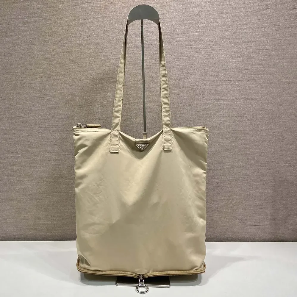 Prada Saffiano Leather Pendant With Re-Nylon Tote Bag for Women in Camel Brown Prada Saffiano Leather Pendant With Re-Nylon Tote Bag for Women in Camel Brown