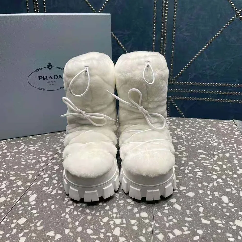 Prada Shearling Apres-ski Boots for Women in White