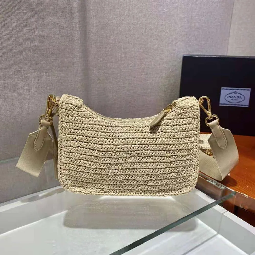 Prada Re-Edition 2005 Raffia Bag for Women in Natural Prada Re-Edition 2005 Raffia Bag for Women in Natural