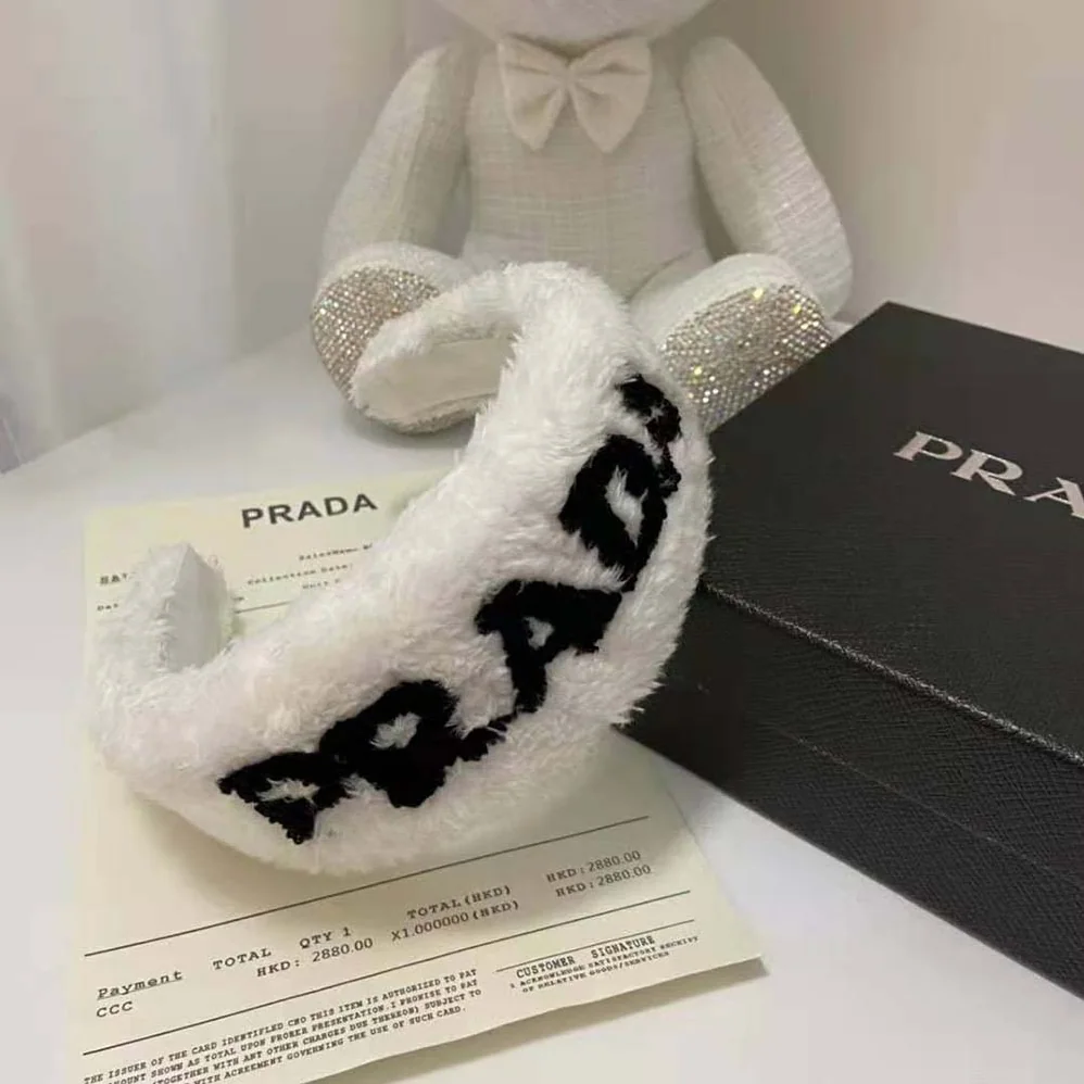Prada Terrycloth Headband with A Beguiling Rounded Design for Women Prada Terrycloth Headband with A Beguiling Rounded Design for Women
