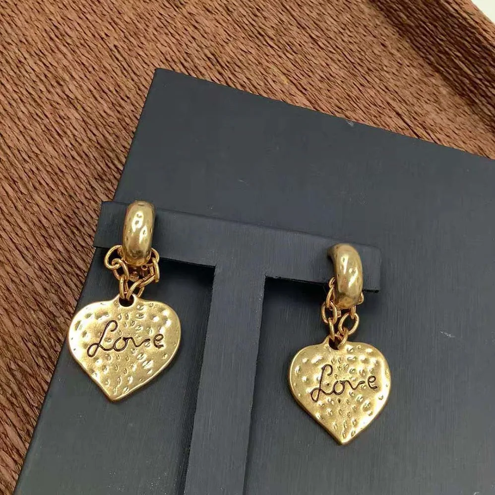 Saint Laurent YSL Love Heart Pendant Earrings in Metal for Women