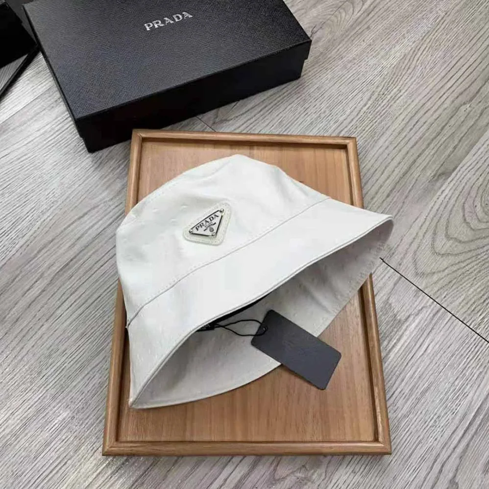 Prada Ostrich Leather Bucket Hat for Women in White Prada Ostrich Leather Bucket Hat for Women in White