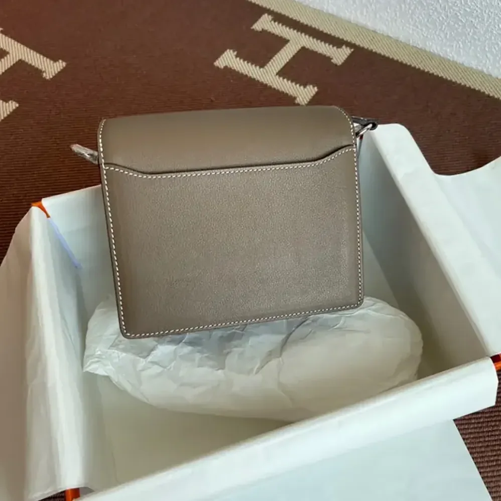 Hermes Roulis Mini Bag in Evercolor Calfskin for Women in Gray/Silver Hermes Roulis Mini Bag in Evercolor Calfskin for Women in Gray/Silver
