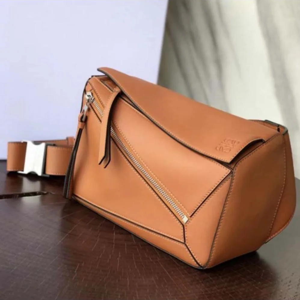 Loewe Small Puzzle Bumbag in Classic Calfskin for Unisex in Brown