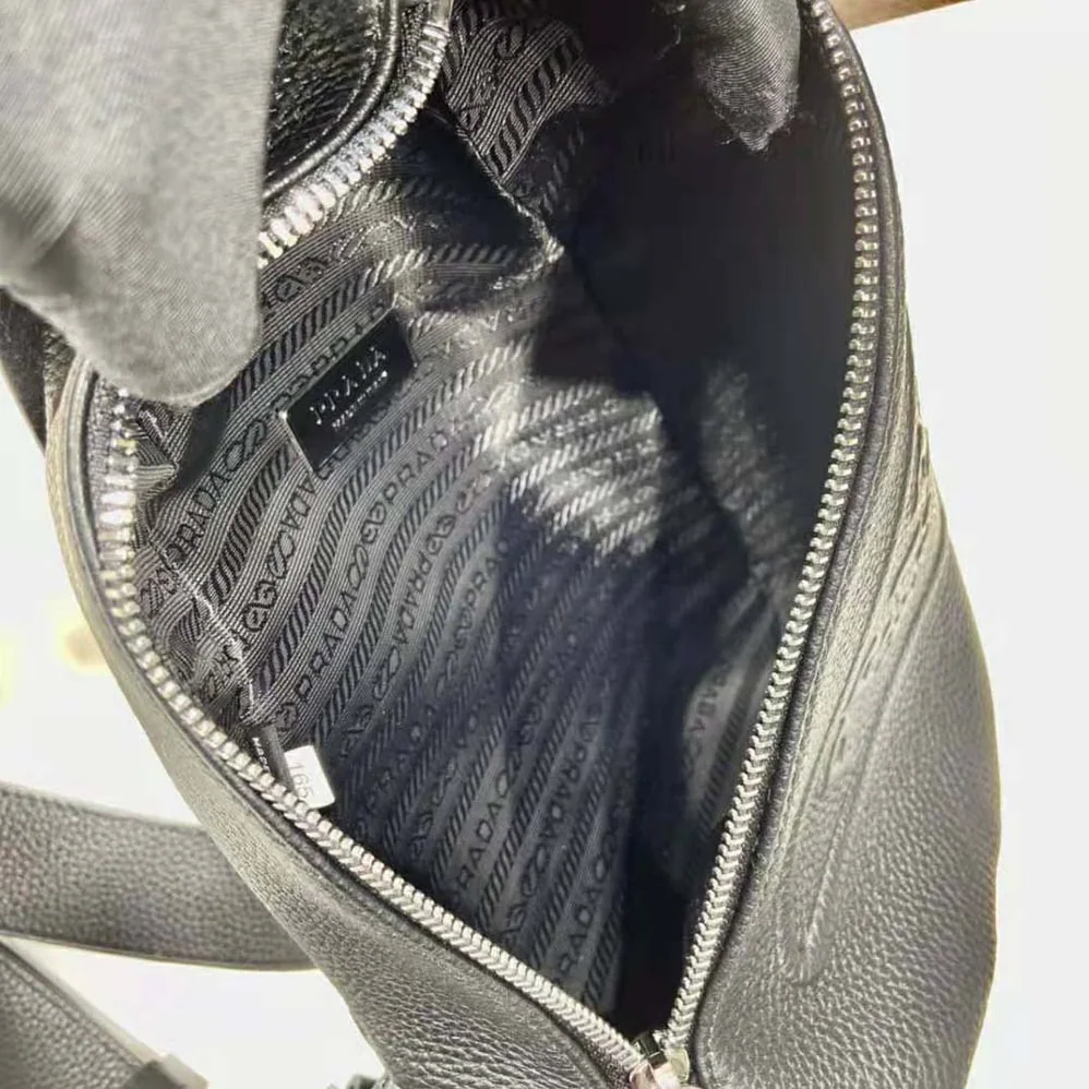 Prada Cross Leather Bag wite Logo-Print Re-Nylon lining for Men in Black Prada Cross Leather Bag wite Logo-Print Re-Nylon lining for Men in Black