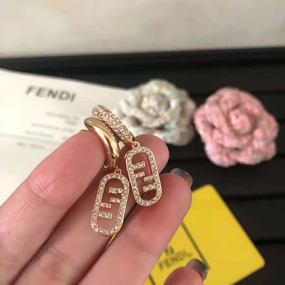 Fendi O Lock Earrings Gold-Colored Earrings in Bronze and Zircon for Women Fendi O Lock Earrings Gold-Colored Earrings in Bronze and Zircon for Women