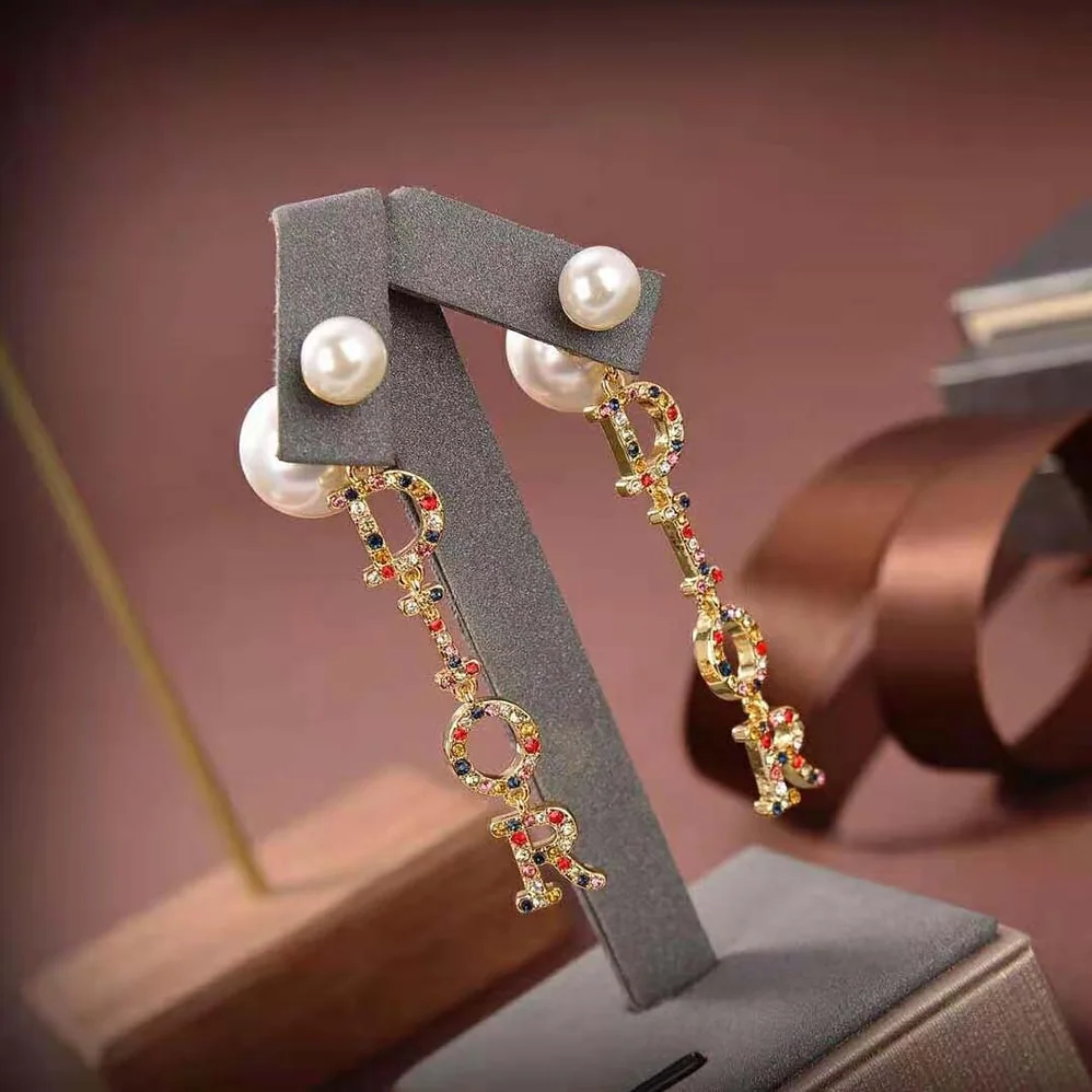 Dior Dior Tribales Earrings Gold-Finish Metal White Resin Pearls for Women Dior Dior Tribales Earrings Gold-Finish Metal White Resin Pearls for Women