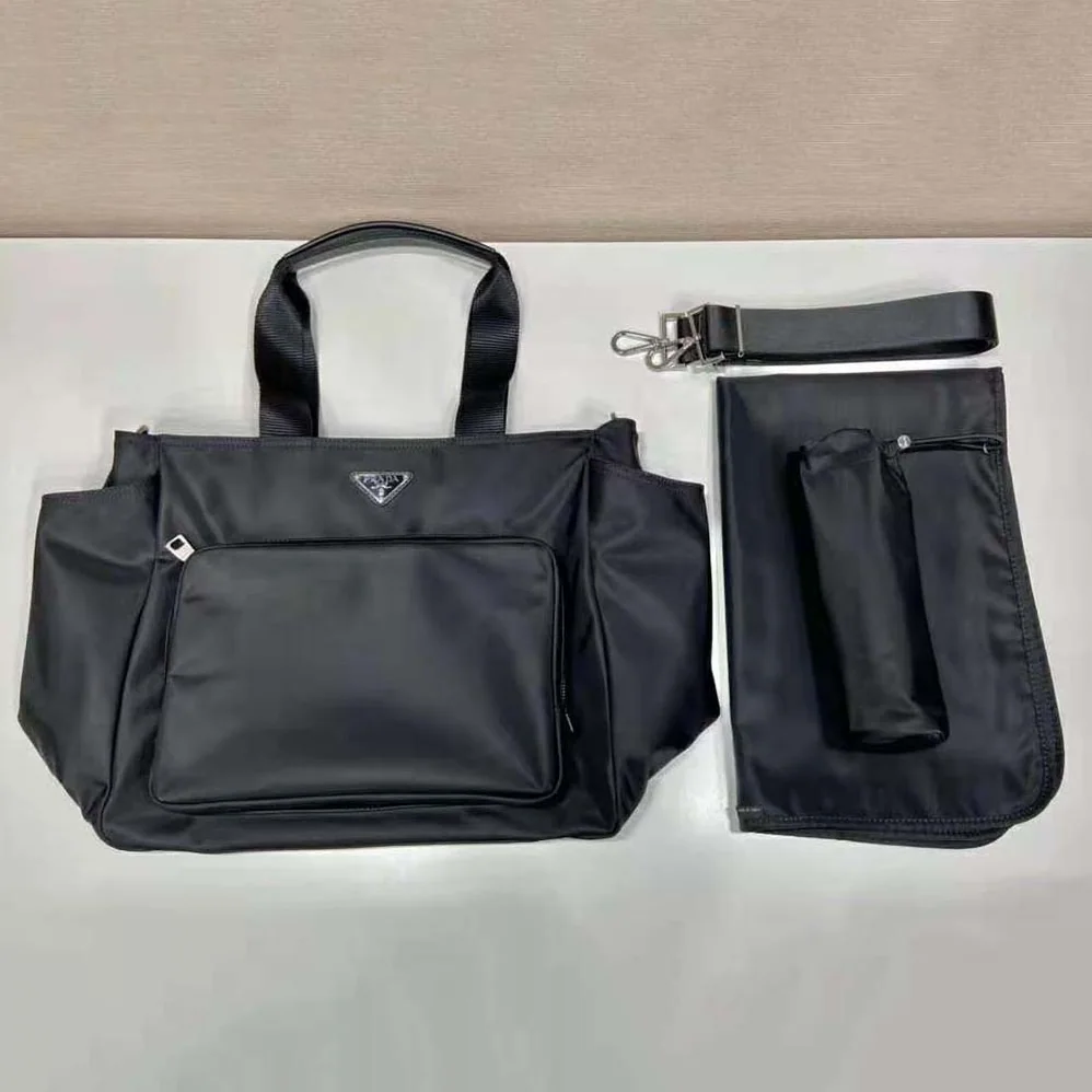 Prada Re-Nylon Baby Bag with Re-Nylon logo-Print lining for Women in Black