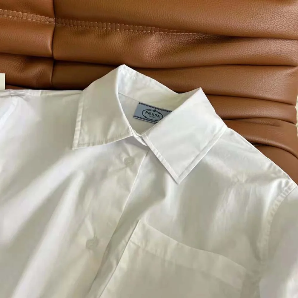 Prada Stretch Poplin Shirt with a Hybrid Design Reinvents for Women Prada Stretch Poplin Shirt with a Hybrid Design Reinvents for Women
