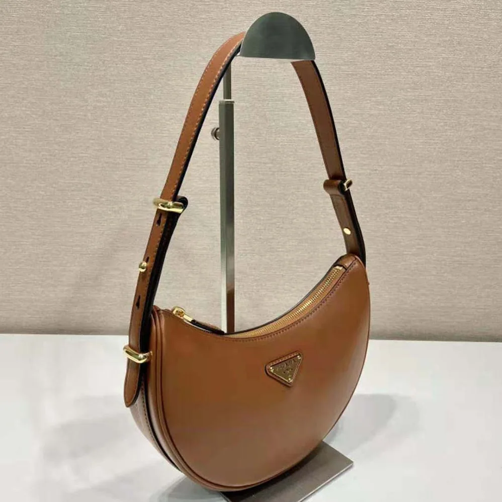 Prada Leather Shoulder Bag with Enameled Metal Triangle Logo for Women in Brown Prada Leather Shoulder Bag with Enameled Metal Triangle Logo for Women in Brown