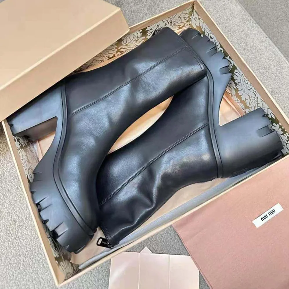 Miu Miu Leather Booties in EVA Sole with Logo for Women in Black Miu Miu Leather Booties in EVA Sole with Logo for Women in Black