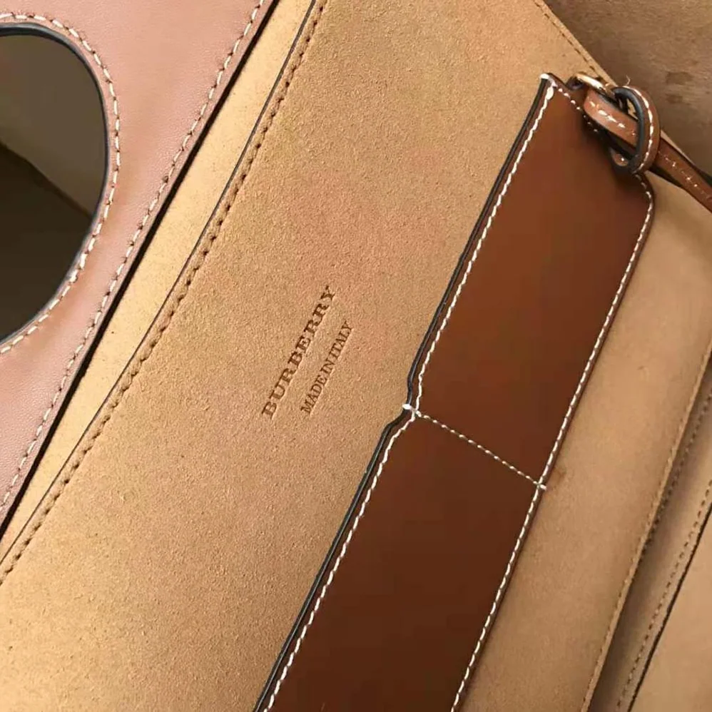 Burberry Mini Leather Soft Pocket Tote for Women in Brown Burberry Mini Leather Soft Pocket Tote for Women in Brown