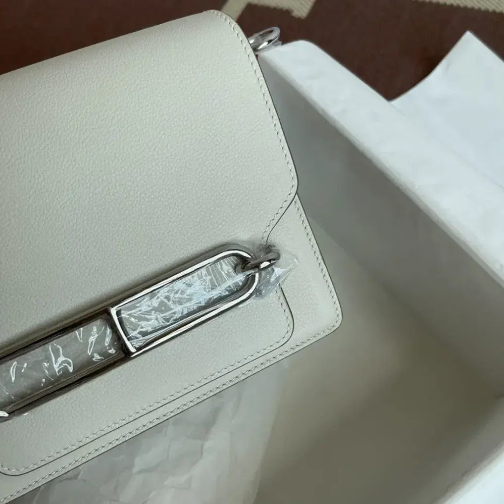 Hermes Roulis Mini Bag in Evercolor Calfskin for Women in White/Silver Hermes Roulis Mini Bag in Evercolor Calfskin for Women in White/Silver