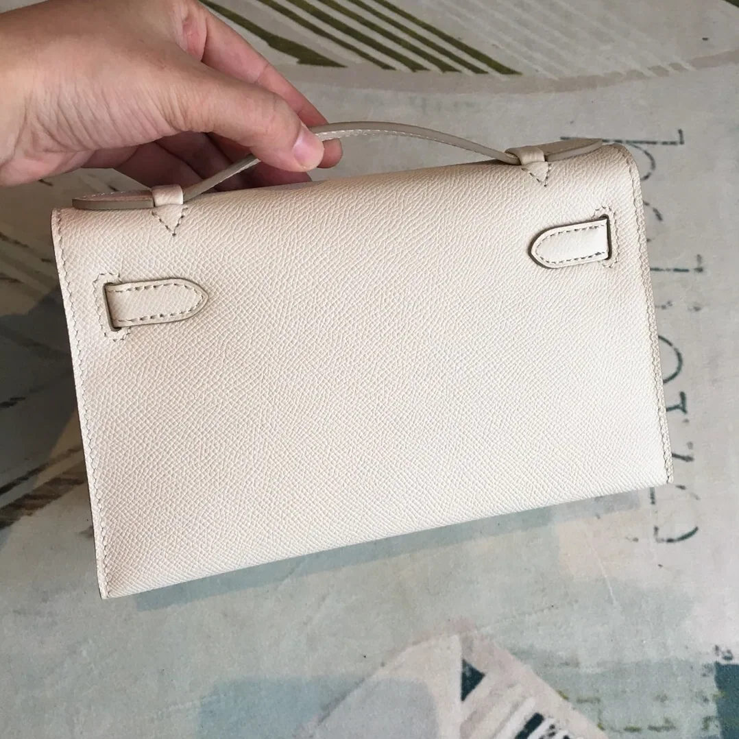 Hermes Kelly Pochettee White Gold Toned Hardware /