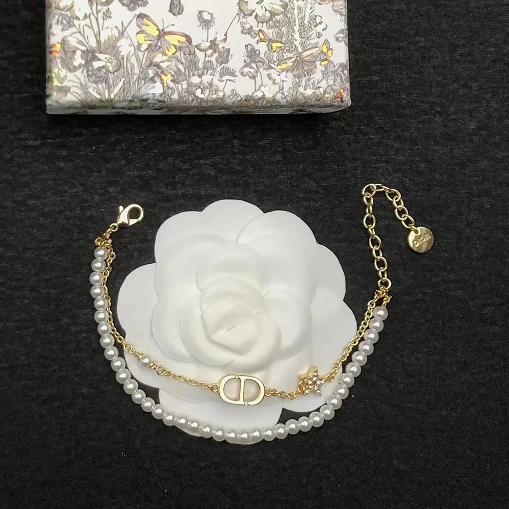 Dior Petit CD Bracelet Gold-Finish Metal with White Resin Pearls and Silver for Women in Tone Crystals Dior Petit CD Bracelet Gold-Finish Metal with White Resin Pearls and Silver for Women in Tone Crystals
