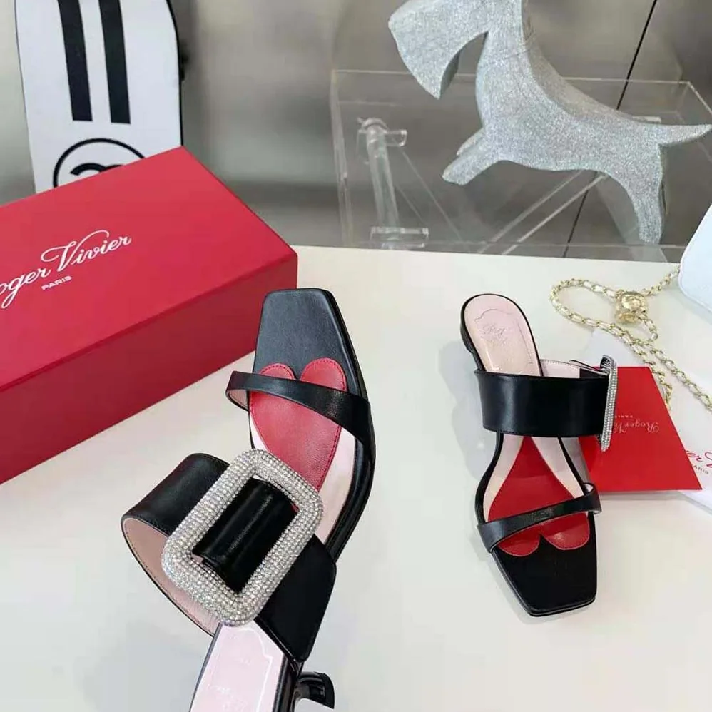 Roger Vivier Viv Choc Side Strass Buckle Mules in Leather for Women in Black Roger Vivier Viv Choc Side Strass Buckle Mules in Leather for Women in Black