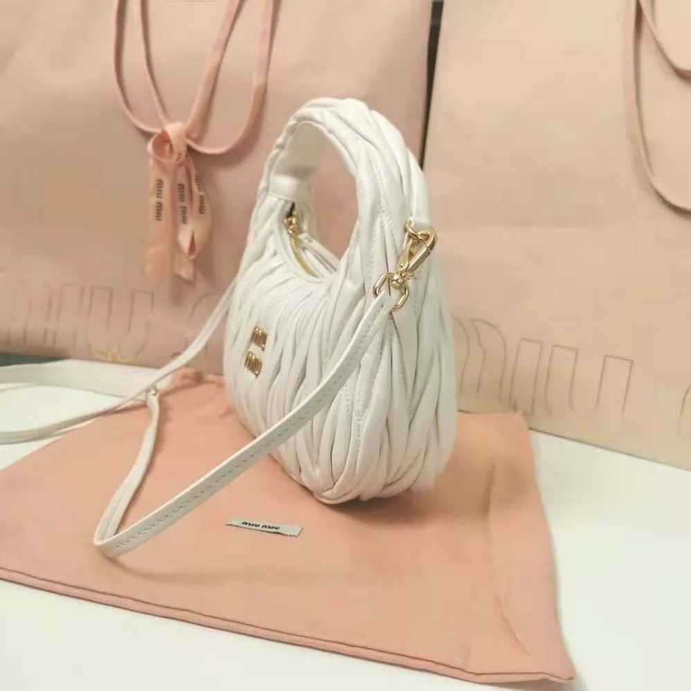Miu Miu Wander Matelassé Nappa Leather Hobo Bag for Women in White Miu Miu Wander Matelassé Nappa Leather Hobo Bag for Women in White