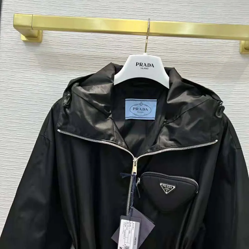 Prada Re-Nylon Hooded Blouson Jacket with Pouch for Women in Black Prada Re-Nylon Hooded Blouson Jacket with Pouch for Women in Black