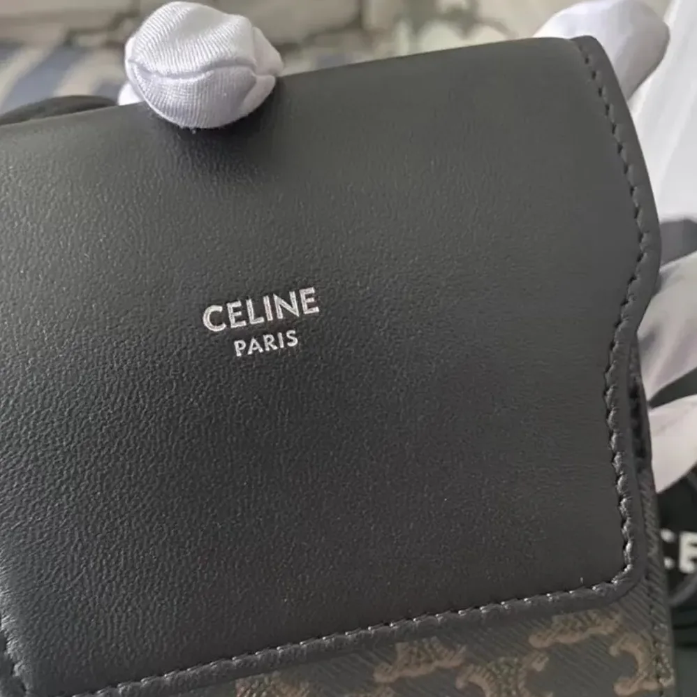Celine Phone Pouch with Flap in Triomphe Canvas and Lambskin for Women in Black Celine Phone Pouch with Flap in Triomphe Canvas and Lambskin for Women in Black