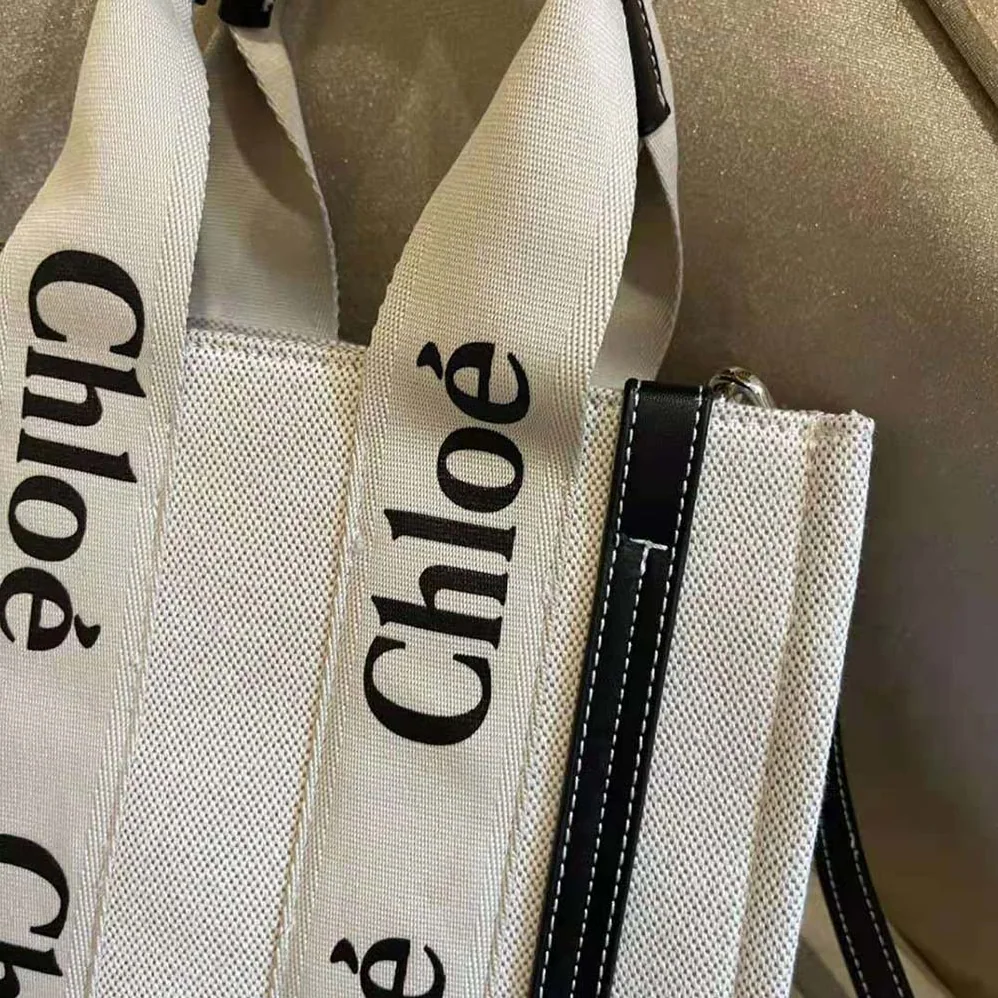 Chloe Small Woody Tote Bag in Cotton Canvas and Shiny Calfskin with Woody Ribbo for Women in Black Chloe Small Woody Tote Bag in Cotton Canvas and Shiny Calfskin with Woody Ribbo for Women in Black
