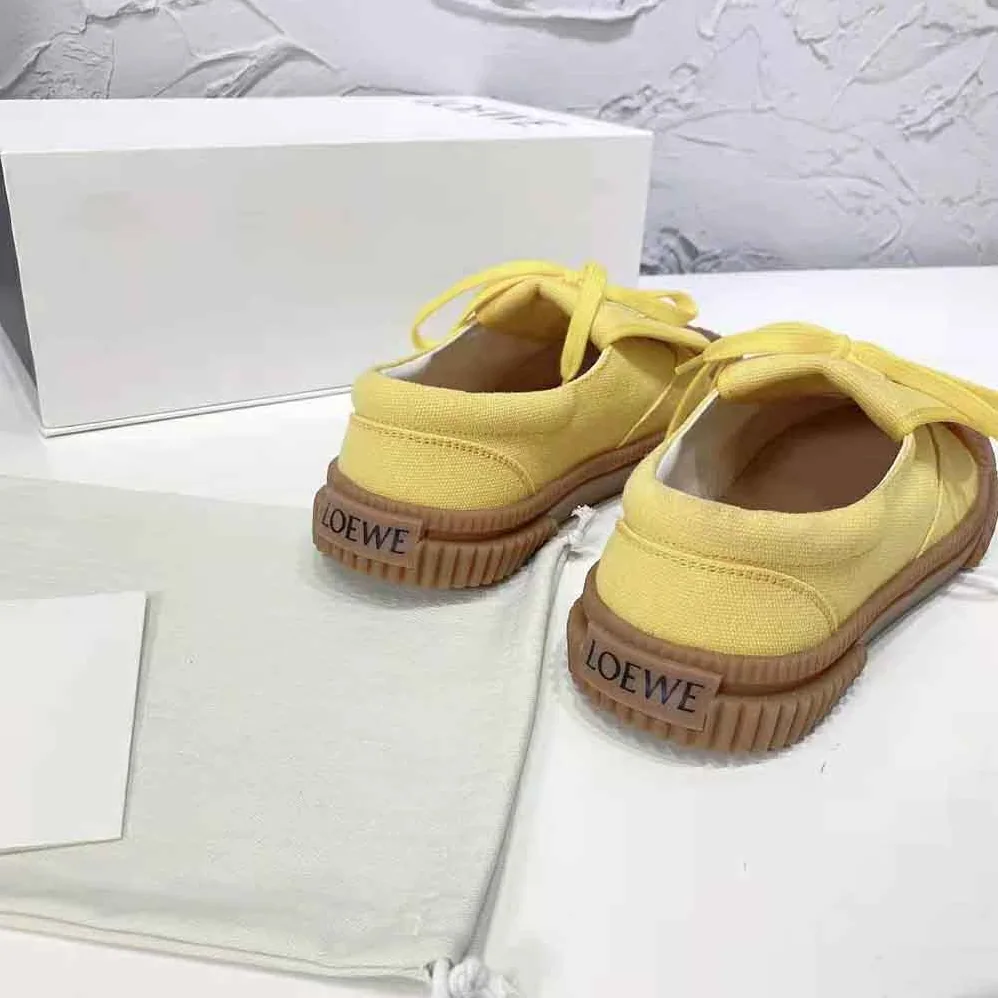 Loewe Anagram Flap Sneaker in Canvas for Women in Yellow Loewe Anagram Flap Sneaker in Canvas for Women in Yellow