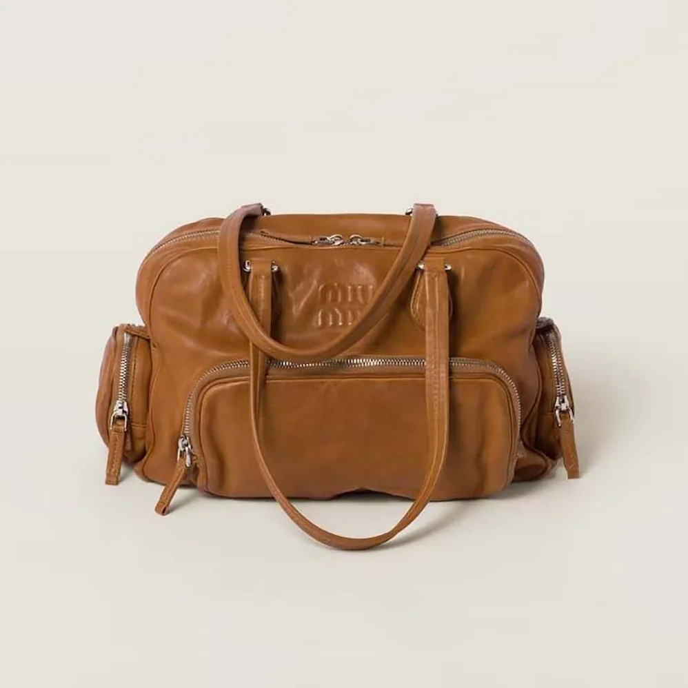 Miu Miu Nappa Leather Top-handle Bag with Embossed Lettering Logo for Women in Brown