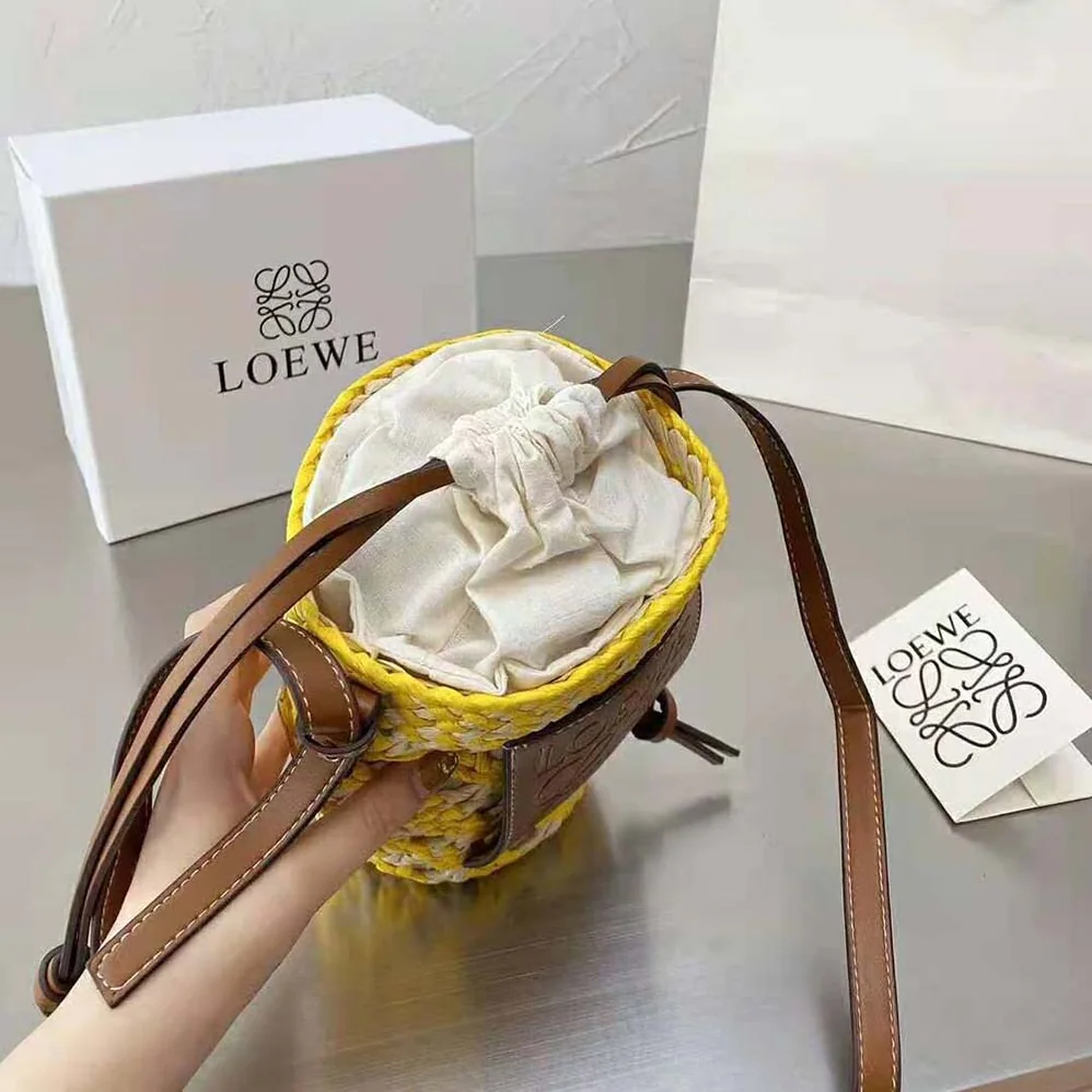 Loewe Cylinder Pocket in Iraca Palm and Calfskin for Women Loewe Cylinder Pocket in Iraca Palm and Calfskin for Women