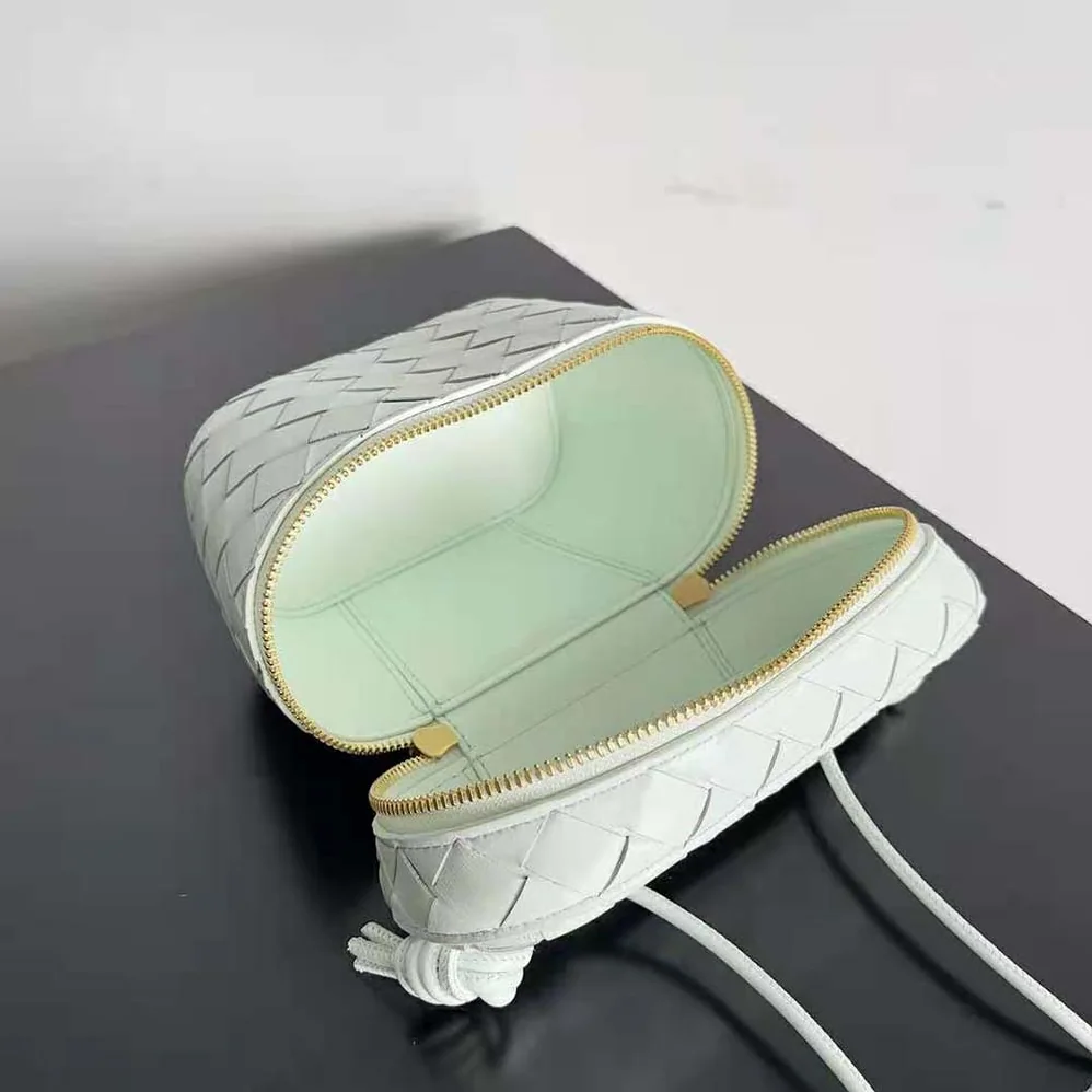 Bottega Veneta Mini Intrecciato Leather Vanity Case with Cross-Body Strap for Women in White Bottega Veneta Mini Intrecciato Leather Vanity Case with Cross-Body Strap for Women in White