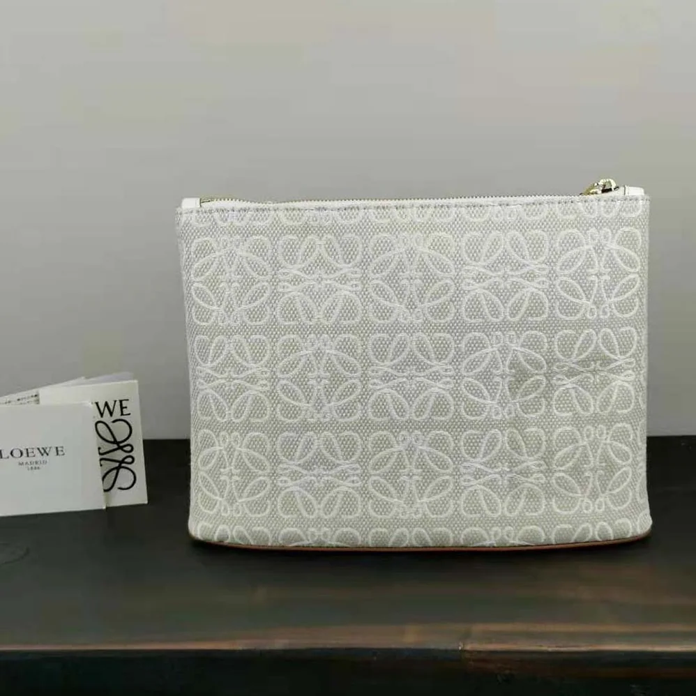 Loewe Oblong Anagram Pouch in Jacquard and Calfskin for Women in White Loewe Oblong Anagram Pouch in Jacquard and Calfskin for Women in White