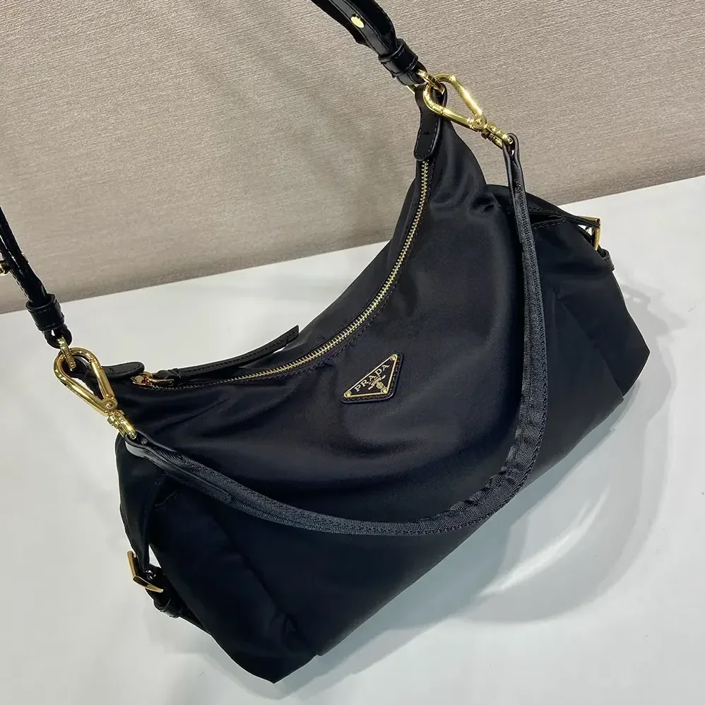 Prada Explore Large Re-Nylon And Leather Bag for Women in Black Prada Explore Large Re-Nylon And Leather Bag for Women in Black