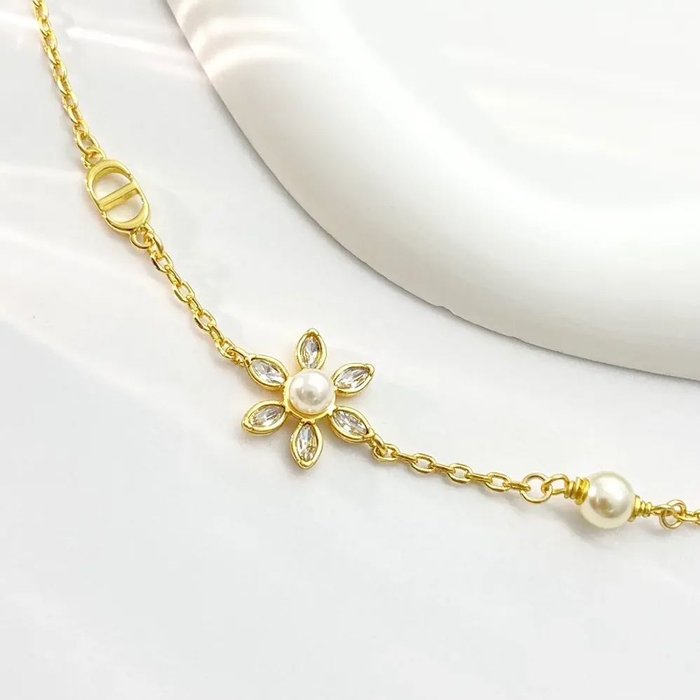 Dior Bloom in Dior Bracelet Gold-Finish Metal with White Resin Pearls and Silver for Women in Tone Crystals Dior Bloom in Dior Bracelet Gold-Finish Metal with White Resin Pearls and Silver for Women in Tone Crystals