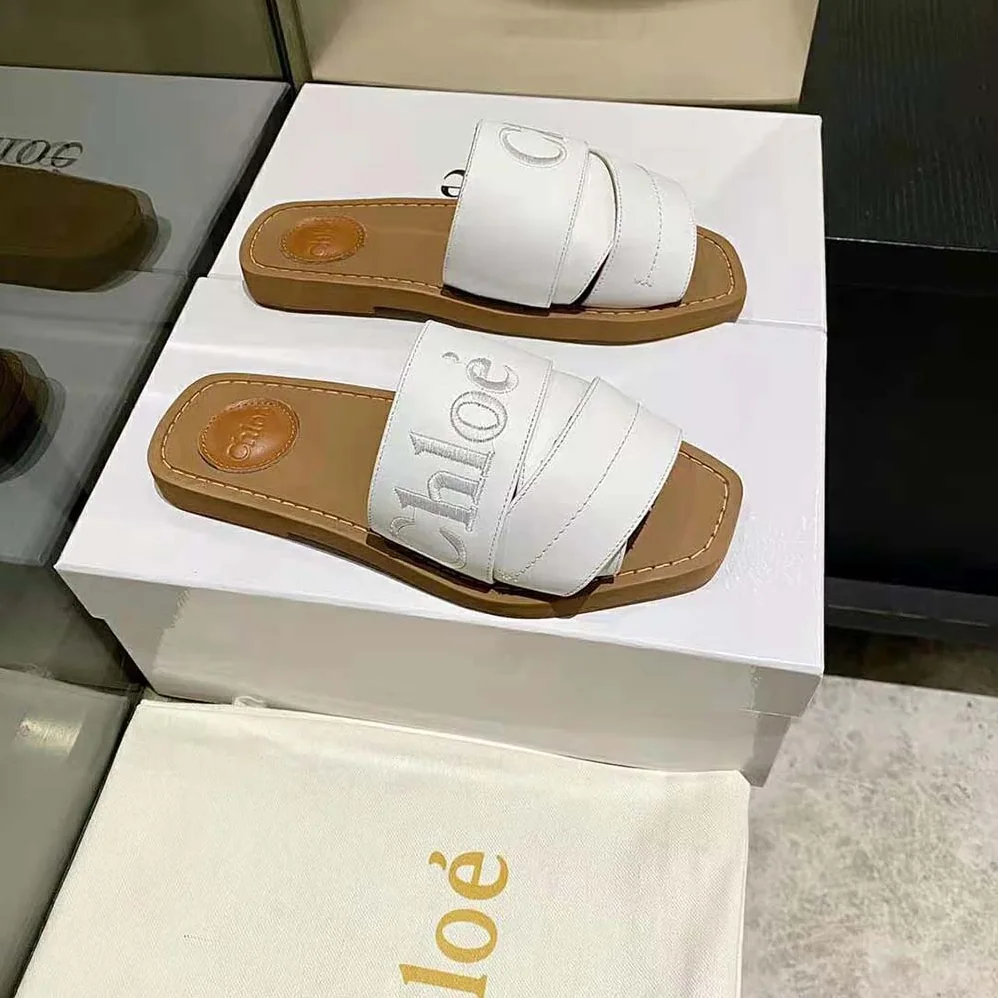 Chloe Woody Flat Mule for Women in White Chloe Woody Flat Mule for Women in White