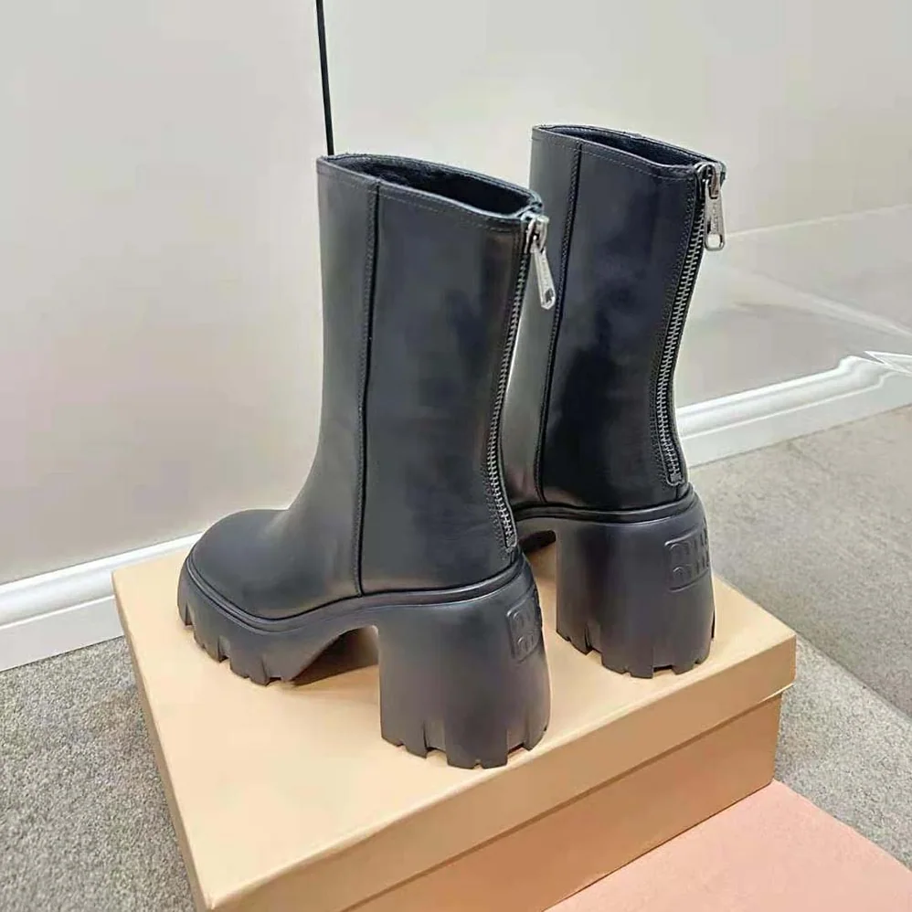 Miu Miu Leather Booties in EVA Sole with Logo for Women in Black Miu Miu Leather Booties in EVA Sole with Logo for Women in Black