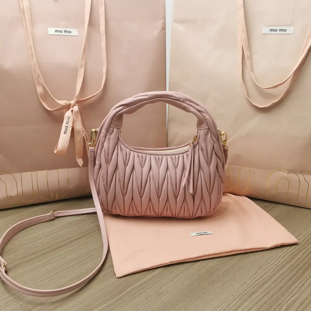 Miu Miu Wander Matelassé Nappa Leather Hobo Bag for Women in Alabaster Pink Miu Miu Wander Matelassé Nappa Leather Hobo Bag for Women in Alabaster Pink