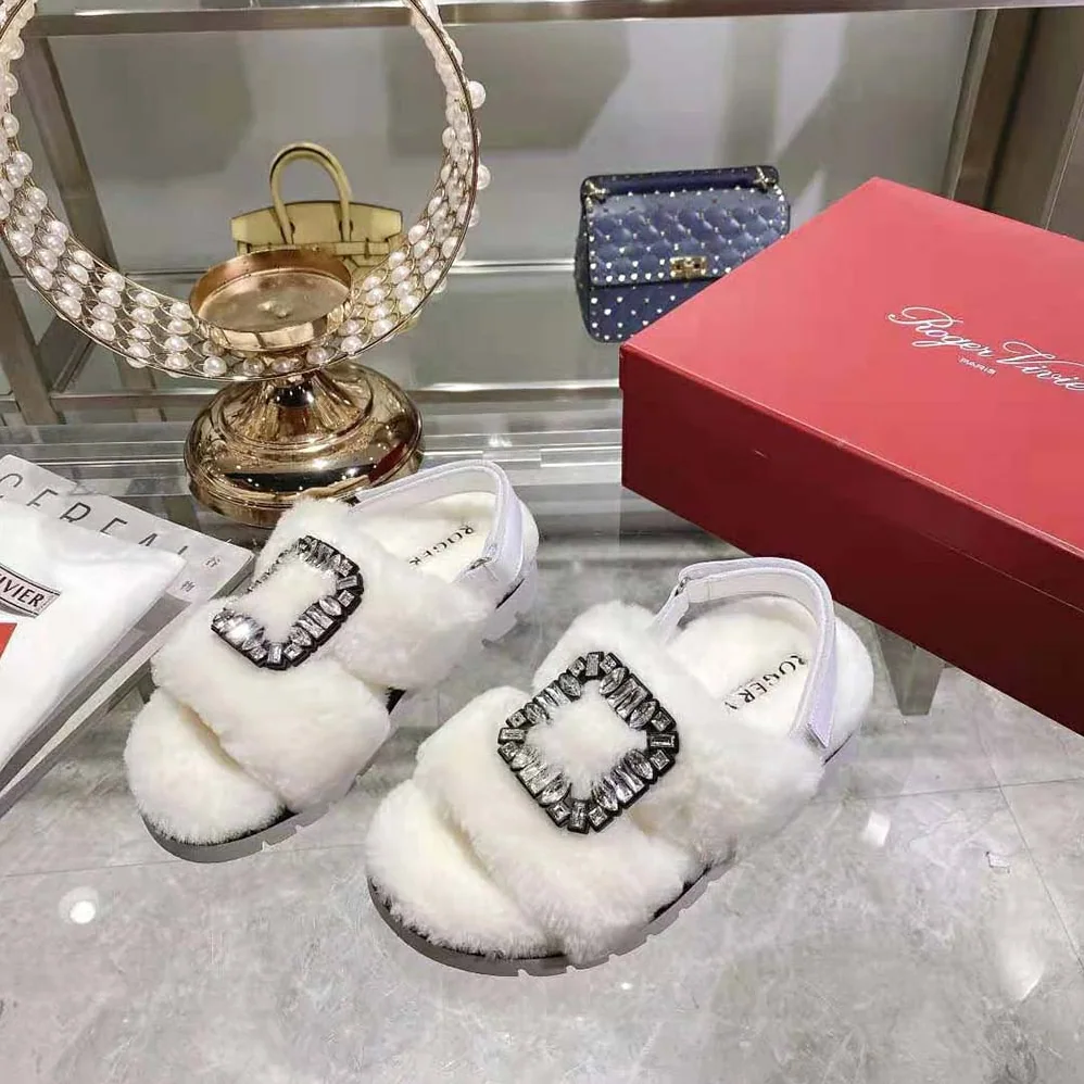 Roger Vivier Viv' Winter Fur Strass Buckle Sandals in Sheepskin for Women in White