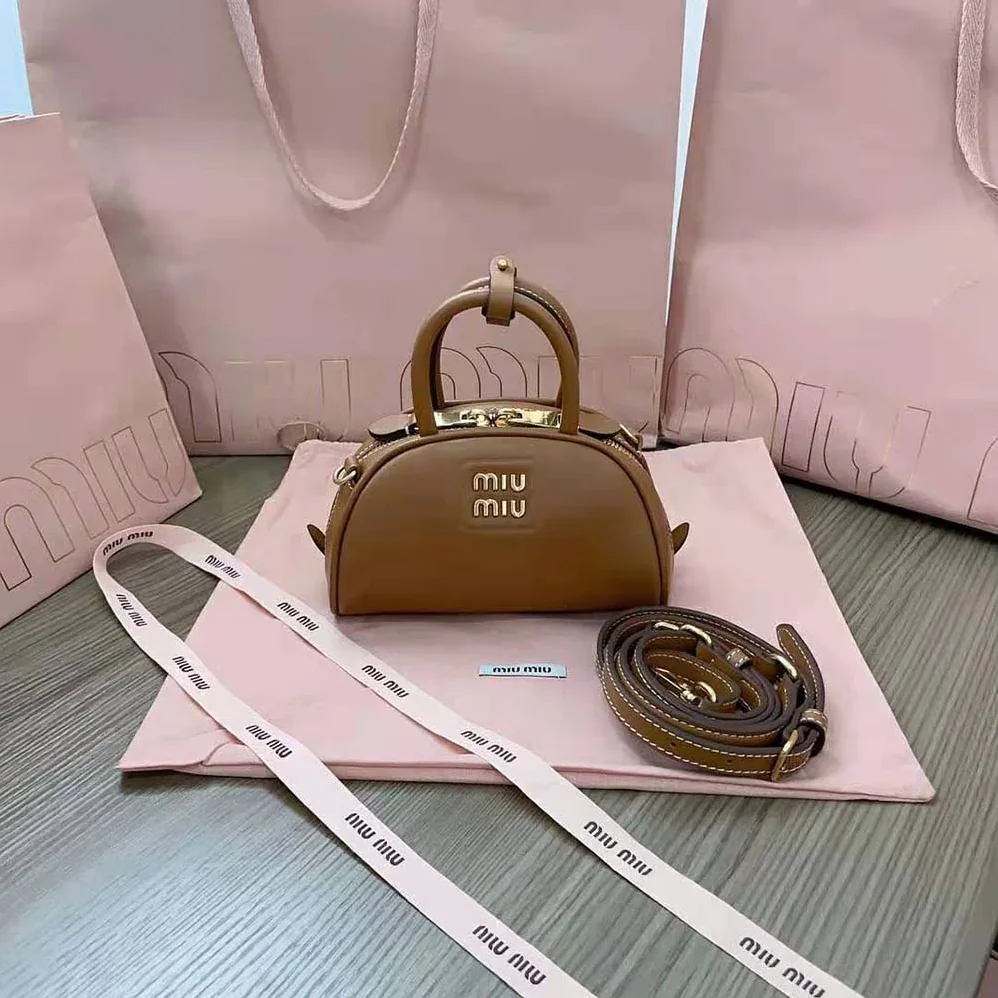 Miu Miu Mini Leather Top-handle Bag for Women in Brown