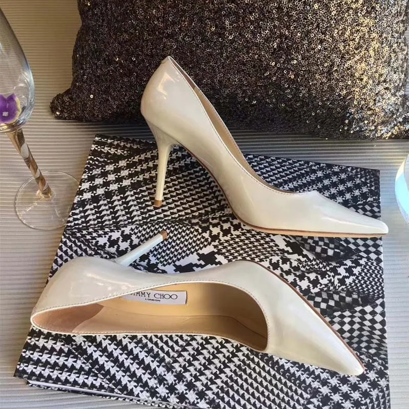 Jimmy Choo Romy 85 Patent Leather Pointy Toe Pumps Shoes for Women in White Jimmy Choo Romy 85 Patent Leather Pointy Toe Pumps Shoes for Women in White