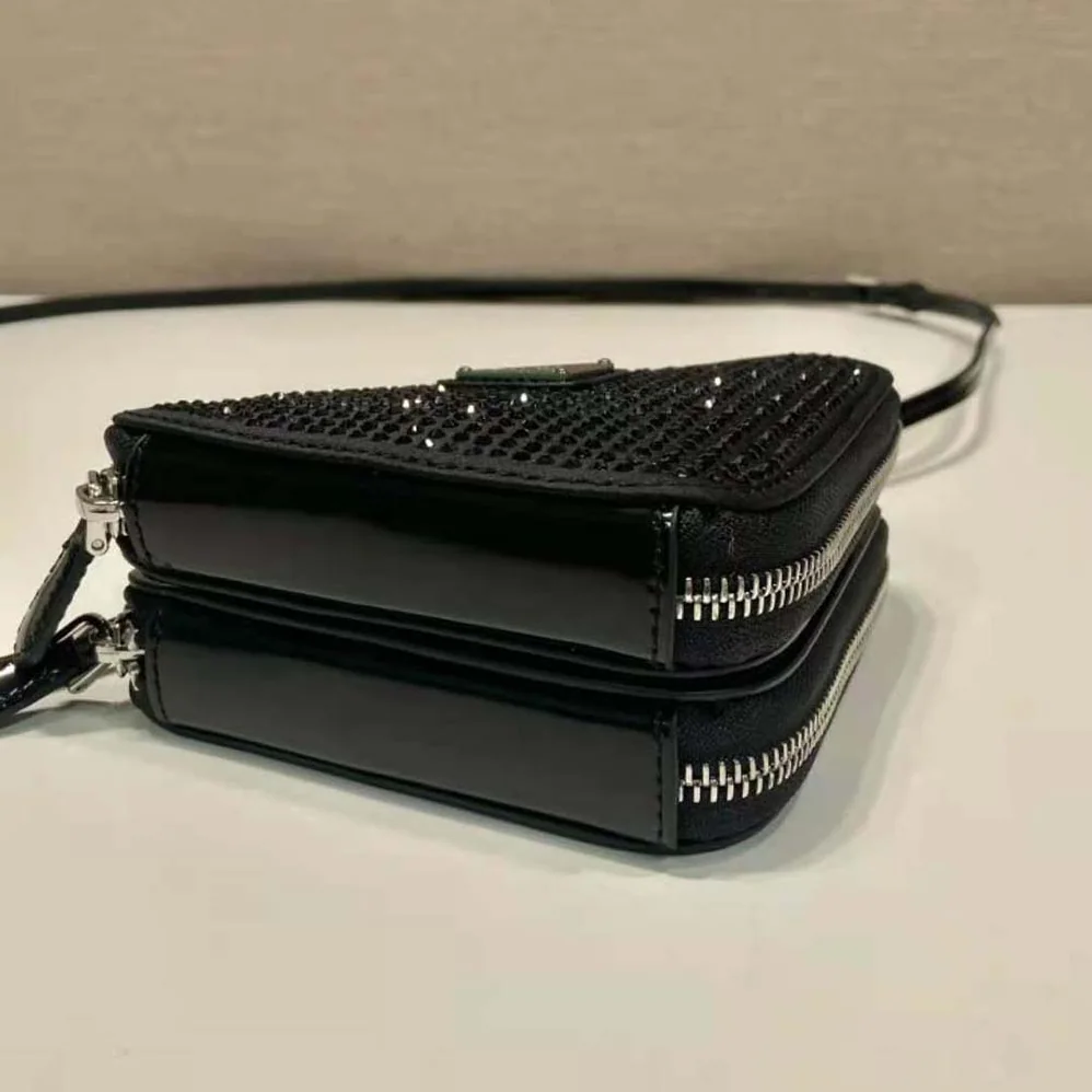 Prada Triangular Embellished Satin and Leather Mini-pouch for Women in Black Prada Triangular Embellished Satin and Leather Mini-pouch for Women in Black