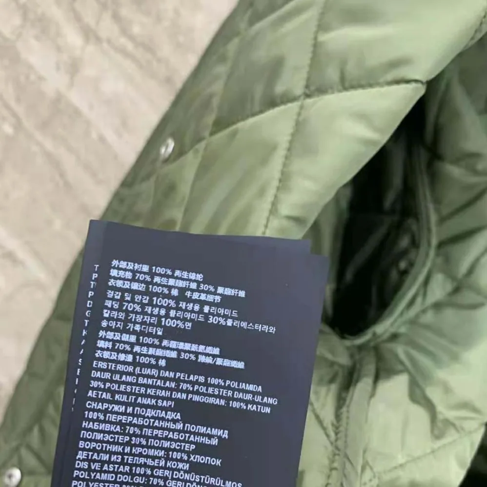 Prada Light Re-Nylon Jacket with Enameled Metal Triangle Logo for Women in Dark Green